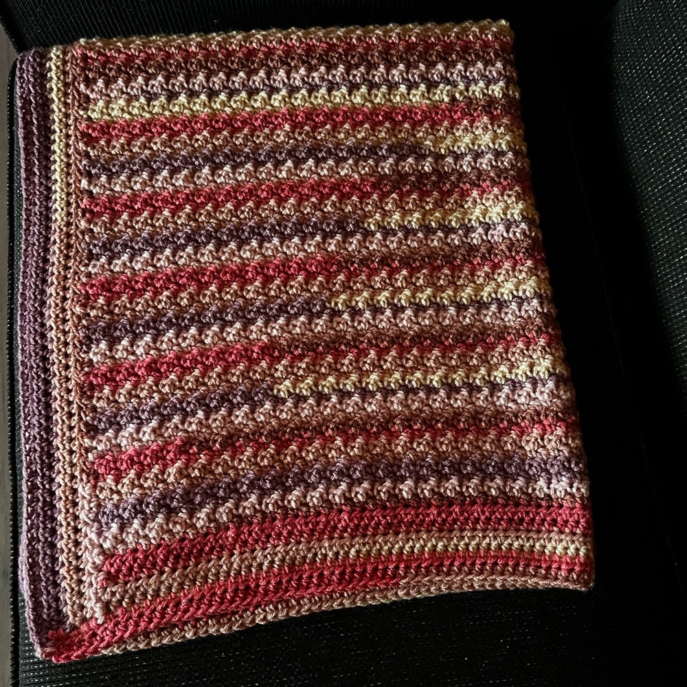 Hand crocheted afghan/blanket. Good for crib/stroller/car or lounging.